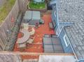 Aerial view of the vacation rental's outdoor deck area with seating and hot tub facilities.