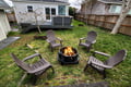Gather around your private fire pit in the spacious backyard, where cozy evenings await with friends and family.