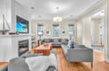 Sink into plush gray sectional seating by the warm fireplace, while tropical scenes on your large TV transport you to paradise.