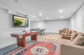 Your private game room awaits with air hockey, ping pong, and cozy seating for friendly competition.