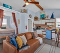 Surf Shack: Alternate Surf Shack view with sofa, sleeping and kitchenette areas.