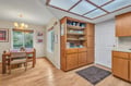 You'll love dining at your own table while skylights flood your kitchen with natural light through beautiful wood framing overhead.