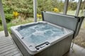 Slip into your private hot tub and let warm bubbles melt away tension while you gaze at peaceful garden views.