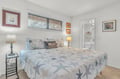 Sink into coastal comfort with ocean-themed bedding and nautical artwork creating your perfect seaside retreat.