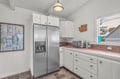 Your fully equipped kitchen features stainless steel appliances and ample counter space for preparing memorable meals during your stay.