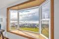 Wake up to breathtaking ocean waves from your cozy window seat, where warm wood frames the endless sea views.