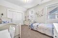 Your little ones will drift off to sleep in this charming ocean-themed room with twin beds and whimsical nautical décor.