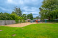 A family-friendly playground with swings and slides sits within the neighborhood, offering a fun spot for outdoor play nearby.