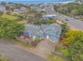 Charming coastal property just moments from the beach, nestled in a peaceful neighborhood with easy access to local amenities.