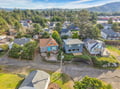 Charming residential neighborhood nestled among rolling hills and lush forests, offering peaceful mountain views and scenic natural surroundings.
