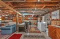Your cozy basement retreat combines rustic charm with modern convenience—perfect for game nights and casual hangouts.