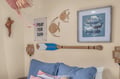 Settle into your cozy coastal retreat, where beach-inspired décor and soft bedding create a laid-back island vibe perfect for unwinding after sun-soaked days.