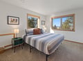 Wake up to stunning natural views through these bright windows, where your cozy bed and peaceful atmosphere promise restful nights.