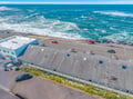 Spectacular beachfront property with direct ocean access and convenient parking just steps from the rolling waves.