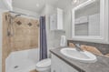Step into your private bathroom with natural stone shower, fresh towels, and thoughtful amenities waiting for your arrival.