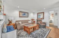 Settle into your cozy living room with comfortable seating and coastal charm for relaxing evenings together.