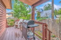 Imagine grilling your favorite meal on your private covered deck, surrounded by lush greenery and peaceful neighborhood views. This outdoor space invites you to savor fresh air and relaxation.