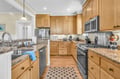 Your fully-equipped kitchen features granite countertops, stainless steel appliances, and everything you need to create memorable meals during your stay.