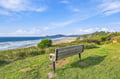 A quiet coastal spot offering sweeping ocean views and natural beauty, just steps from the sandy shore.