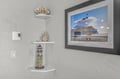 Charming coastal decor creates a serene atmosphere with coral displays, lighthouse charm, and inspiring beach artwork to make your stay memorable.