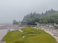 This coastal property sits at the edge of a pristine natural landscape, surrounded by lush forested hillsides and offering direct beach access for your seaside adventures.