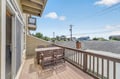 Step onto your private wooden balcony and breathe in the fresh air while enjoying neighborhood views.