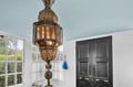 Relax under this stunning Moroccan-inspired pendant light that fills your space with warm, golden ambiance and exotic charm.