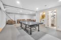 Your private game room features a ping pong table and comfy lounge seating for endless entertainment.