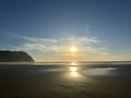 Seaside Beach: Sunset over the ocean.