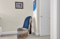 Settle into your stylish leopard-print chair, perfectly positioned for reading or relaxing in this cozy corner of your room.
