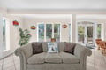 Relax in your bright, playful living space with garden views and comic-inspired art creating the perfect family atmosphere.