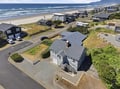 Coastal vacation rental situated in a quiet beachfront neighborhood with direct beach access, mountain views, and oceanfront living just steps from the sand.