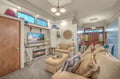 Sink into the plush sofa, enjoy your favorite shows on the flat-screen TV, and feel the warmth of the cozy fireplace—your perfect home away from home.
