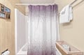 Your private bathroom features a fresh shower with soft towels ready for you, combining comfort and simple style.