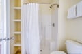 Your bright bathroom features a refreshing shower-tub combo and convenient built-in shelving for all your toiletries.