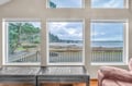 Sink into this cozy window seat and watch waves roll across the pristine shoreline, framed by your private oceanfront view.