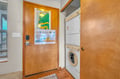 Your private laundry nook keeps travel light with stacked washer and dryer tucked conveniently near your room entrance.