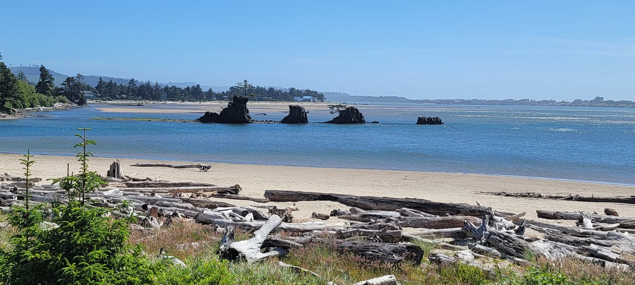 Stunning coastal scenery surrounds the property, with sandy shores, clear waters, and distinctive rock formations dotting the bay—a perfect backdrop for your seaside getaway.