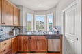 Your well-appointed kitchen features granite countertops, stainless steel dishwasher, and a charming bay window where you can enjoy scenic views while cooking.