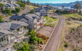 Stunning coastal retreat situated in a scenic hillside neighborhood with sweeping water and mountain views.