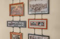 A gallery wall showcases the neighborhood's history through vintage photographs and artwork, offering a glimpse into the area's rich past and character.