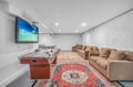Your private game room awaits with air hockey, ping pong, and cozy seating for movie nights on the big screen.