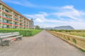 Property situated along scenic coastal road with mountain views and peaceful rural surroundings.