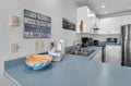 Your fully equipped kitchen awaits with modern appliances and peaceful coastal vibes to inspire memorable meals.