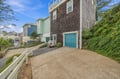 Charming coastal property nestled in a quiet neighborhood with convenient driveway parking and easy access to your beachside retreat.