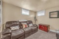 Sink into plush leather recliners in your private retreat, where charming decor meets comfort for perfect movie nights or quiet reading.