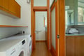Your fully equipped laundry space features modern washer and dryer plus storage for all your convenience needs.