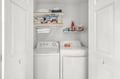Freshen up effortlessly with your own in-unit washer and dryer, complete with detergent and organized storage for linens and essentials.
