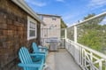 Step out to your private balcony for fresh air and tranquil treetop views. Fire up the grill for an outdoor meal or unwind in the bright turquoise chairs.