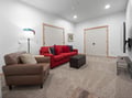Unwind in your spacious living room with plush seating, perfect for movie nights or relaxing conversations after your adventures.